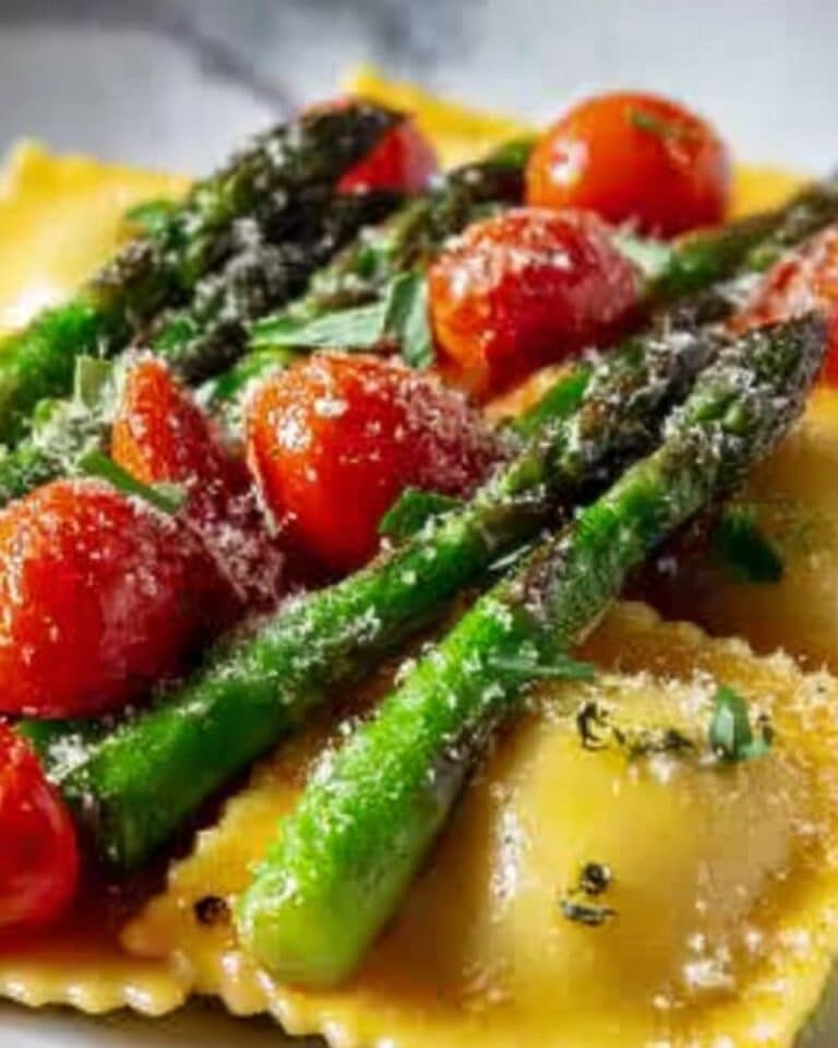 Ravioli with Tomatoes, Asparagus, Garlic, and Herbs Recipe