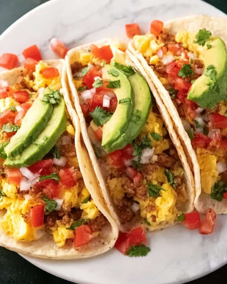 Breakfast Tacos with Scrambled Eggs, Sausage or Bacon, and Fresh Toppings Recipe