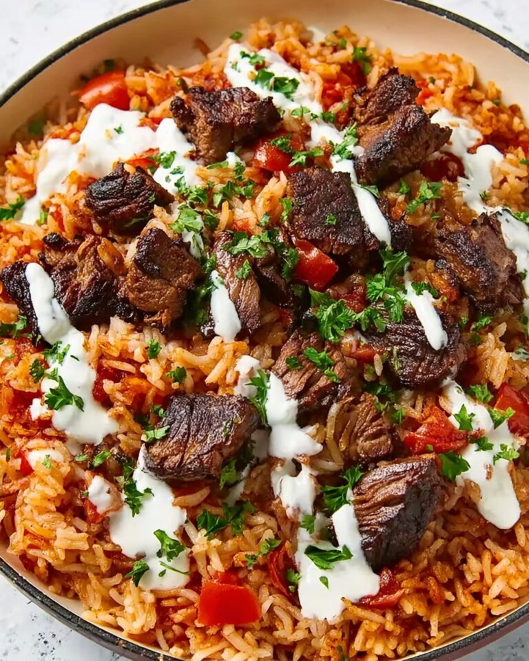 Creamy Queso Rice with Juicy Steak Strips Recipe