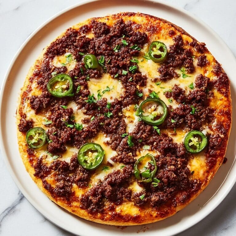 Spicy Ground Beef Pizza with Hot Honey and Jalapeños Recipe