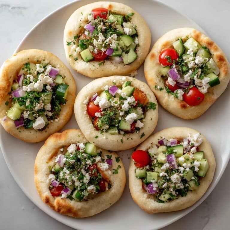 Savory Mini Pita Pockets with Fresh Vegetables and Hummus Recipe